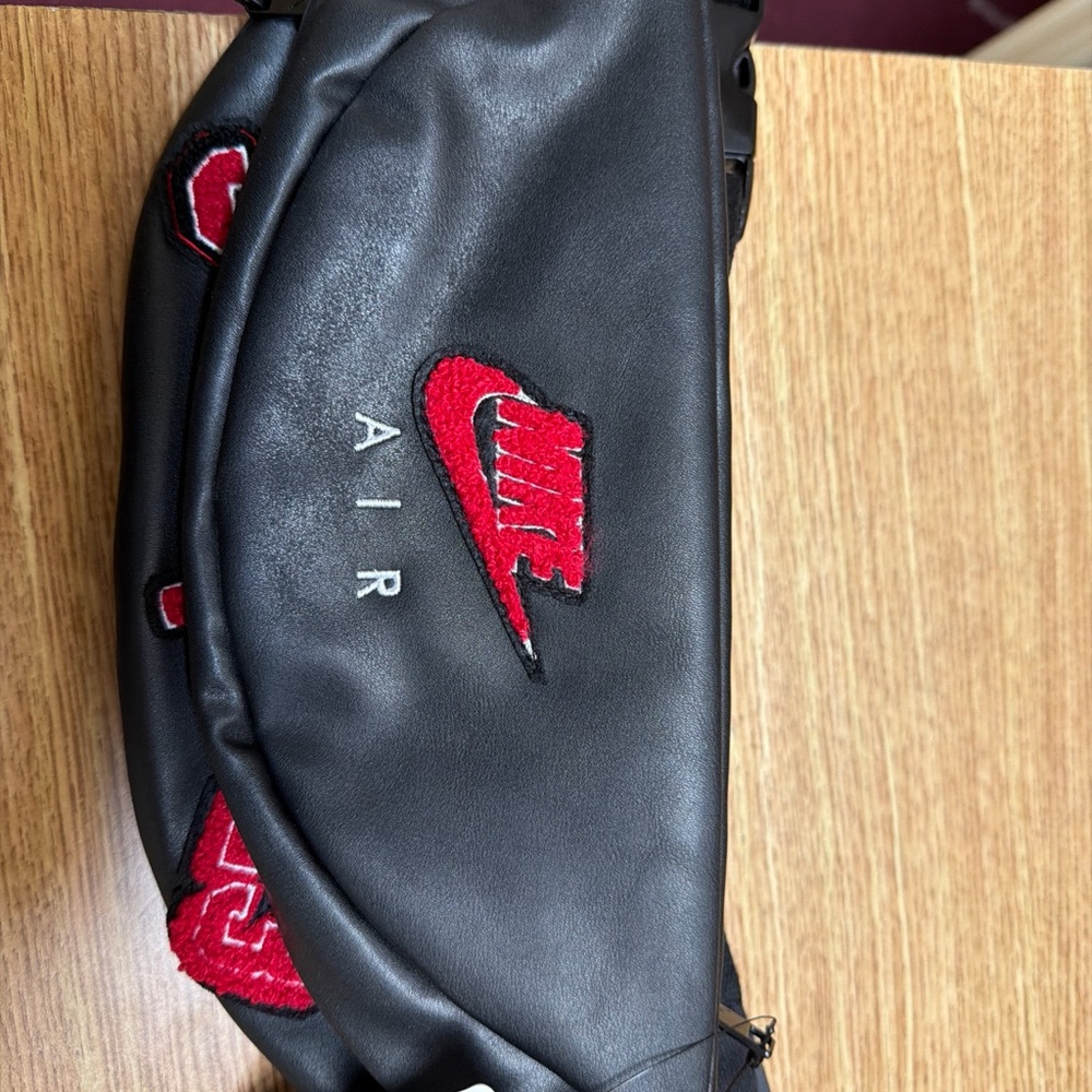 Nike Black Waist Bag with Red Logo